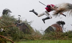 World Press Photo Awards 2017 - Sports - First Prize, Singles - Tom Jenkins, The Guardian - Grand National Steeplechase<br>Jockey Nina Carberry flies off her horse Sir Des Champs as they fall at The Chair fence during the Grand National steeplechase during day three of the Grand National Meeting at Aintree Racecourse on April 9th 2016 in Liverpool, England.  Tom Jenkins, The Guardian/Courtesy of World Press Photo Foundation/Handout via REUTERS   THIS IMAGE HAS BEEN SUPPLIED BY A THIRD PARTY. FOR EDITORIAL USE ON WORLD PRESS PHOTO ONLY. NO RESALES. NO CROPPING