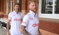 Ben Stokes and James Anderson of England walk back into the pavilion after a team photo at Lord's.