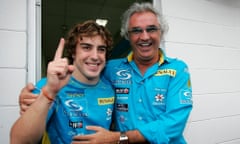 Fernando Alonso celebrates with Renault team boss Flavio Briatore