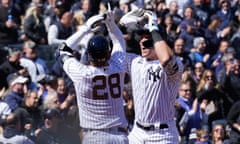 The New York Yankees' Aaron Judge, right, celebrates his solo home run with Josh Donaldson