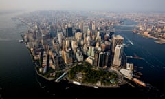 Manhattan Office Vacancy Rate Drops In Second Quarter<br>Office and residential buildings stand in the financial district of Manhattan in this aerial photograph taken over New York, U.S., on Wednesday, July 7, 2010. Manhattan's office vacancy rate dropped for the first time in three years in the second quarter as almost 7 million square feet of leases were signed, brokerage Cushman & Wakefield Inc. said. The falling vacancy in New York, the country's biggest and costliest office market, contrasted with the national vacancy rate of 17.4 percent, the highest level in 17 years. Photographer: Daniel Acker/Bloomberg via Getty Images
AMERICA; AMERICAS
REAL ESTATE; LAND; PROPERTY
OFFICE; OFFICE BUILDING
VACANCY; VACANCIES
BUSINESS; FINANCE
BUILDING; BUILDINGS
SKYSCRAPER; SKYSCRAPERS
AERIAL; AERIALS