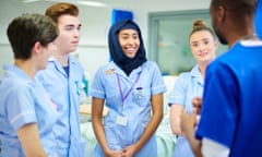 nursing students on the wardfour young medical students chat to each other and their manager after a shift on the wards