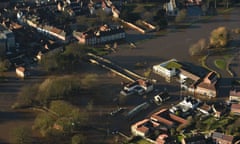 Properties surrounded by floodwater in Tadcaster, North Yorkshire after the river Wharfe burst its banks. 