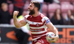 Abbas Miski celebrates scoring a try