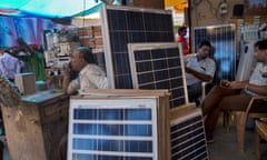 In this Oct. 1, 2015 photo, solar panels are displayed for sale at a market in New Delhi, India. India plans a fivefold boost in renewable energy capacity in the next five years to 175 gigawatts, including solar power, wind, biomass and small hydropower dams. (AP Photo/Saurabh Das)