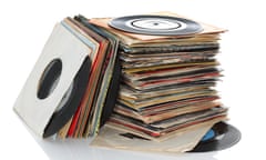 Pile of retro vinyl 45rpm singles records.