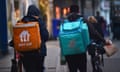 Just Eat and Deliveroo employees deliver food.