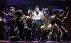 Alexander Kazmin (centre) strikes a pose during open rehearsals in Moscow.