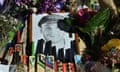 Bats and caps are left outside the stadium in a tribute to the late Phillip Hughes prior to the first day play of the the first Test match between Australia and India at Adelaide Oval in Adelaide on December 9, 2014. AFP PHOTO / SAEED KHAN IMAGE RESTRICTED TO EDITORIAL USE - STRICTLY NO COMMERCIAL USESAEED KHAN/AFP/Getty Images