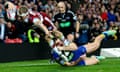 Wigan Warriors’ Dominic Manfredi goes over to score his side’s third try.