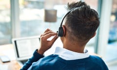 Man working in a call centre (posed by model)