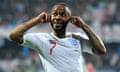 Raheem Sterling  gestures to the Montenegro supporters after scoring a goal