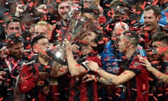 Michael Parkhurst celebrates with his teammates after Atlanta’s victory