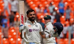 Indian batting great Virat Kohli celebrates his first century in 42 innings against Australia at Narendra Modi Stadium.