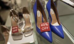 Women's shoes are tagged 40% off during Black Friday shopping at Macy's in Fashion Centre at Pentagon City in Arlington, Va., Friday, Nov. 25, 2022. (AP Photo/Carolyn Kaster)