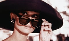 Elegant Audrey<br>1961: Belgian-born actor Audrey Hepburn (1929 - 1993) lowers her sunglasses in a still from director Blake Edwards' film, 'Breakfast at Tiffany's.' (Photo by Paramount Pictures/Fotos International/Getty Images)