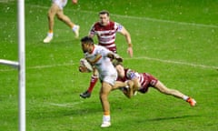 Manu Ma'u evades being tackled by Jai Field to score his second try.