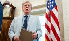 John Bolton – wearing a seersucker suit – waits in the Oval Office in July 2019.