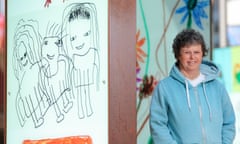 SSallie Culy poses with her artwork on Courtenay Place, Wellington, New Zealand.