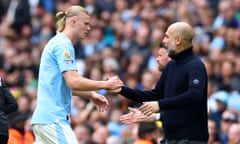 Pep Guardiola shakes hands with Erling Haaland