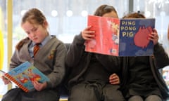 Pupils reading books.