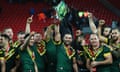 Cameron Smith lifts the Four Nations trophy with his Australia team-mates after their 34-8 win over New Zealand at Anfield