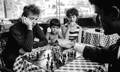 Bob Dylan playing chess with his tour manager, Victor Maymudes, at Bernard's Cafe Espresso in Woodstock, 1964. 