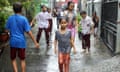 kids playing outside in rain