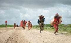 Women displaced by conflict arrive at a camp near Jowhar, Somalia, in November 2013