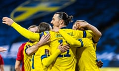 Sweden v Georgia - FIFA World Cup 2022 Qatar Qualifier<br>STOCKHOLM, SWEDEN - MARCH 25: Zlatan Ibrahimovic of Sweden and teammates embrace after Viktor Claesson scored their first goal during the FIFA World Cup 2022 Qatar qualifying match between Sweden and Georgia on March 25, 2021 in Stockholm, Sweden. (Photo by Michael Campanella/Getty Images)