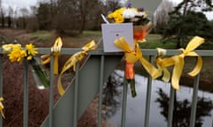 Flowers and tributes to Nicola Bulley on a footbridge over the River Wyre.