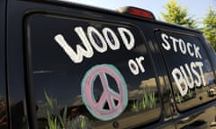 FILE - This Aug. 14, 2009 file photo shows a van decorated with “Woodstock or Bust” at the original Woodstock Festival site in Bethel, N.Y. Woodstock 50 is officially cancelled. Organizers announced Wednesday, July 31, 2019 that the troubled festival that hit a series of setbacks in the last four months won’t take place next month. The three-day festival was originally scheduled for Aug. 16-18, but holdups included permit denials and the loss of a financial partner and a production company.(AP Photo/Stephen Chernin, File)