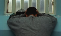 Young inmate looking depressed in prison cell, Portland Young Offenders Institution, Portland, Dorset, United Kingdom.<br>ABC98D Young inmate looking depressed in prison cell, Portland Young Offenders Institution, Portland, Dorset, United Kingdom.