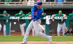 Chicago Cubs' Cody Bellinger connects for a solo home run against the Oakland Athletics during the first inning of a spring training baseball game, Wednesday, March 22, 2023, in Mesa, Ariz. (AP Photo/Matt York)