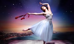 Dancer poses with red ballet shoes in her hand