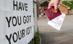 A UK voter carrying a passport