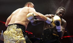 Zhilei Zhang knocks down Deontay Wilder during the fifth round early Sunday morning in Riyadh.