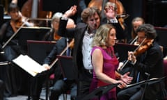 Maxim Emelyanychev conducting the Scottish Chamber Orchestra, with soprano Carolyn Sampson, in a pink dress, singing, at Prom 19, Elijah, at the Royal Albert Hall