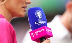 A close-up on a commentator's microphone at Euro 2024