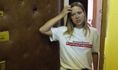 Russian journalist Maria Zholobova stands next to the door of her apartments after the search in Moscow, Russia, Tuesday, June 29, 2021. Russian authorities on Tuesday morning raided the apartments of several investigative journalists and their family members, a move that comes amid mounting pressure on Russia’s independent media outlets. Police searched the apartments of Roman Badanin, chief editor of the Proekt investigative online outlet, and Maria Zholobova, one of its journalists. (AP Photo/Pavel Golovkin)