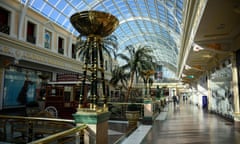 A shopper walks through Intu’s near-deserted Trafford Centre during the coronavirus lockdown.