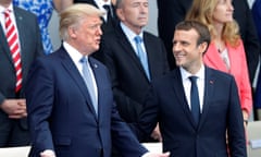 Emmanuel Macron and Donald Trump attend the traditional Bastille Day military parade on the Champs-Elysees in Paris