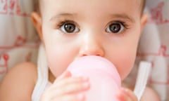 Baby girl drinking from bottle<br>Baby drinking milk/formula from bottle