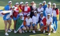 The European team pose with the Solheim Cup after their triumph.
