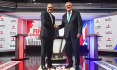 Scott Morrison shakes hands with Anthony Albanese