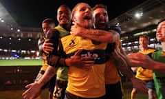 Jason Cummings leads celebrations after the Central Coast Mariners became A-League Men's champions.