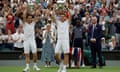 Wesley Koolhof (left) and Neal Skupski show off their trophies on Centre Court.