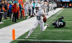 Miami Dolphins wide receiver Tyreek Hill (10) crosses the goal line for a touchdown against the New York Jets during the second quarter of Friday’s game.