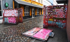 A gate that prevents the public to catch a glimpse into Herbertstraße, a street in the red light district paved with brothels and reserved to men only, that was torn down by topless members of feminist movement Femen on Women's Day is seen in Hamburg, northern Germany.