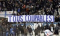 Marseille supporters display a banner reading "All guilty" after the bad results of their team during the League One soccer match against Monaco at the Velodrome stadium, in Marseille, southern France, Sunday, Jan. 13, 2019. (AP Photo/Claude Paris)